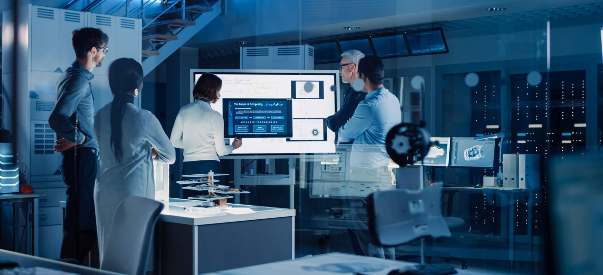 Engineering team reviewing systems in a data center